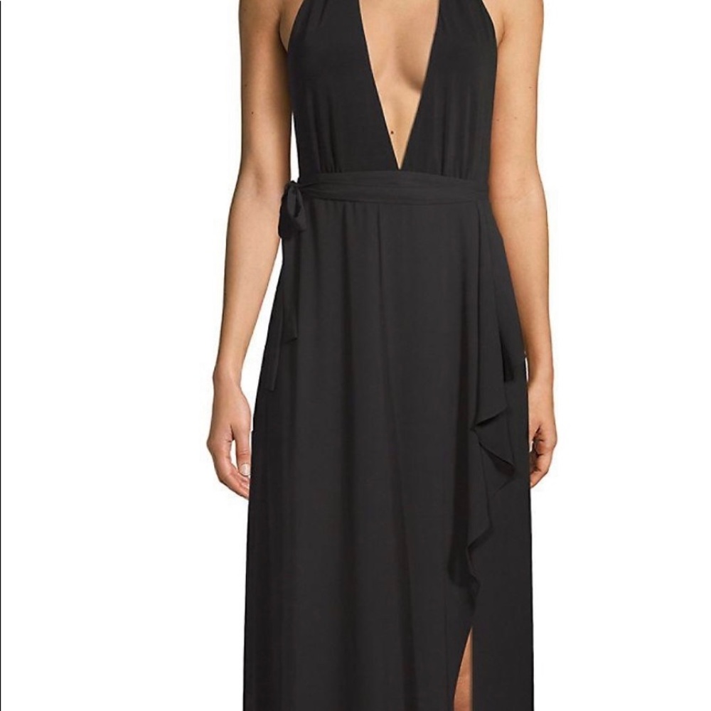 New with tags BCBG deep v neck gown. High slit, built in panty. Never been worn